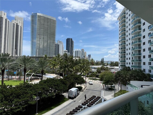 Building Photo - 19370 Collins Ave