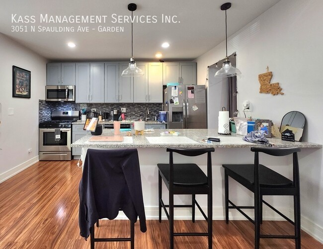 Building Photo - 3051 N Spaulding Ave