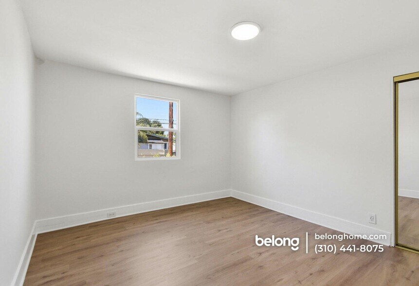 Building Photo - 1474 W Vernon Ave
