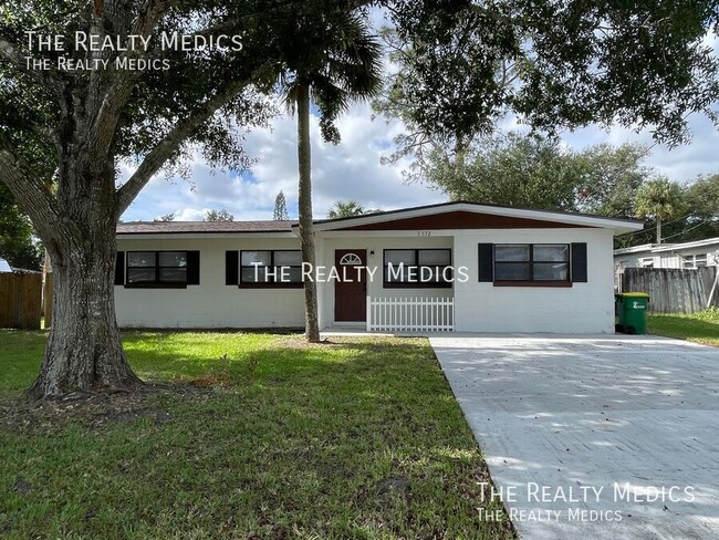 Primary Photo - Spacious 4-Bedroom, 2-Bathroom Home with F...