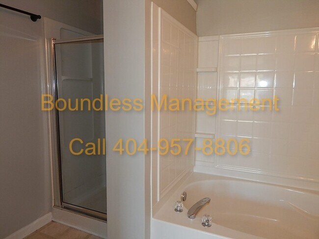 Building Photo - Larger Than It Looks! 3 BR/2.5 BA Town Hom...