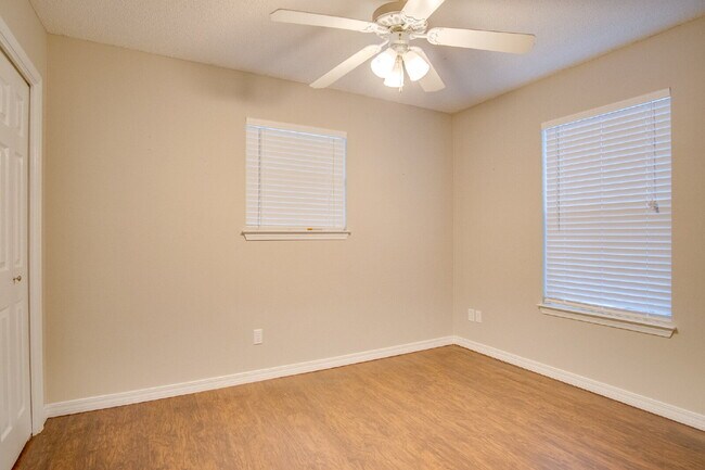 Building Photo - Live the Gulf Breeze Waterfront Life – Dock, Canal Access & Boat Lift!