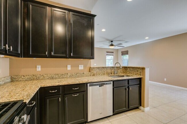 Building Photo - Better Than New with Stunning Designer Upgrades Throughout!
