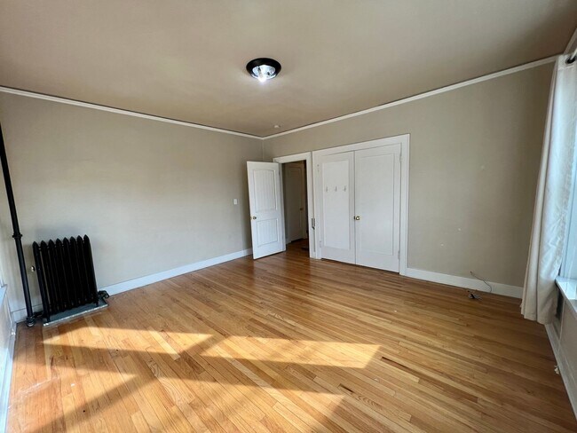 Building Photo - Classic Living at the Novell! Close to UW ...