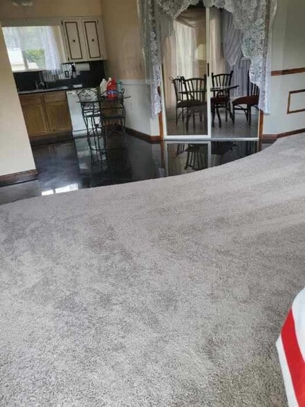 Living area granite and carpet - 10871 SW 90th Ct