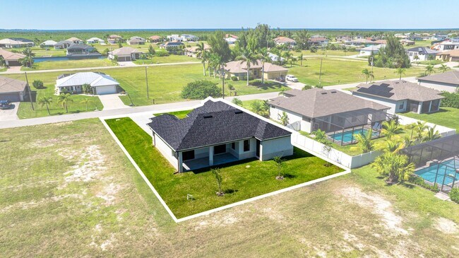 Building Photo - Brand-New Coastal Retreat | 4BR Home in NW Cape Coral