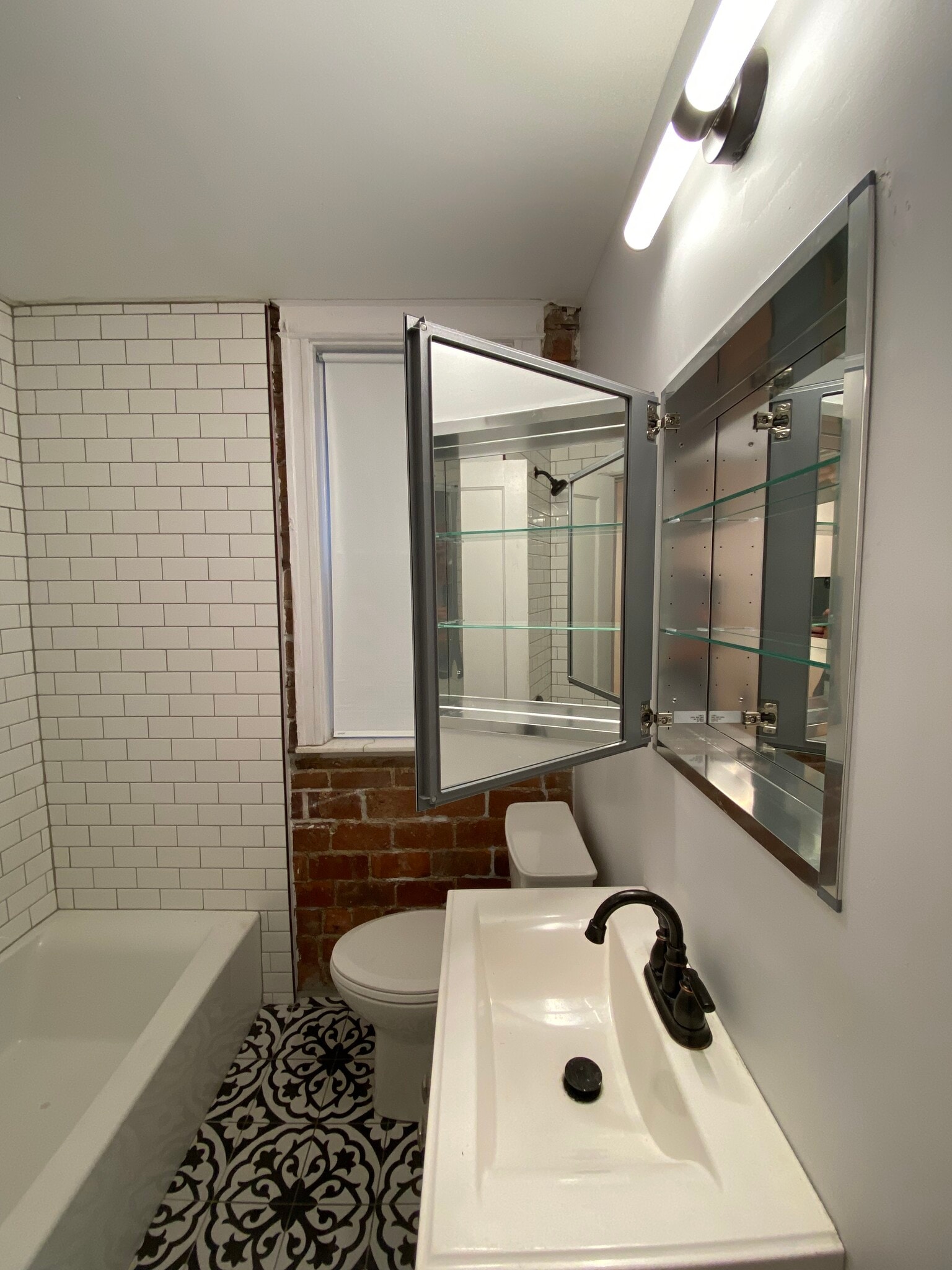 Bathroom view with the open medicine cabinet - 5017 S Broadway