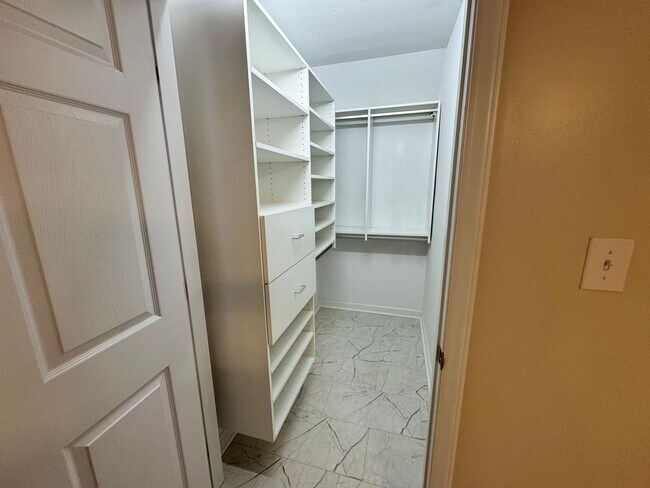 Building Photo - Beautiful, Conveninetly located First Floor Condo