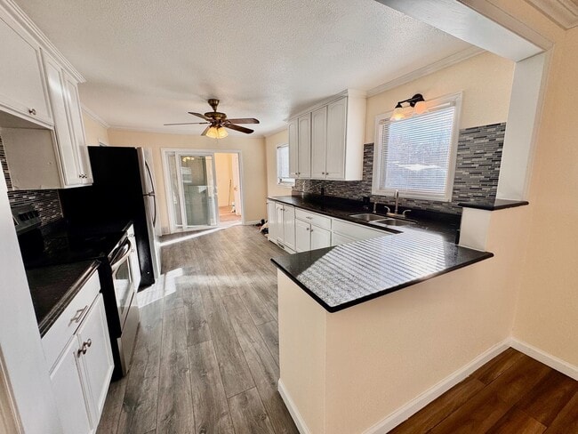 Building Photo - Move-In Ready 4BR Home with Finished Basement, Flex Space & Large Yard