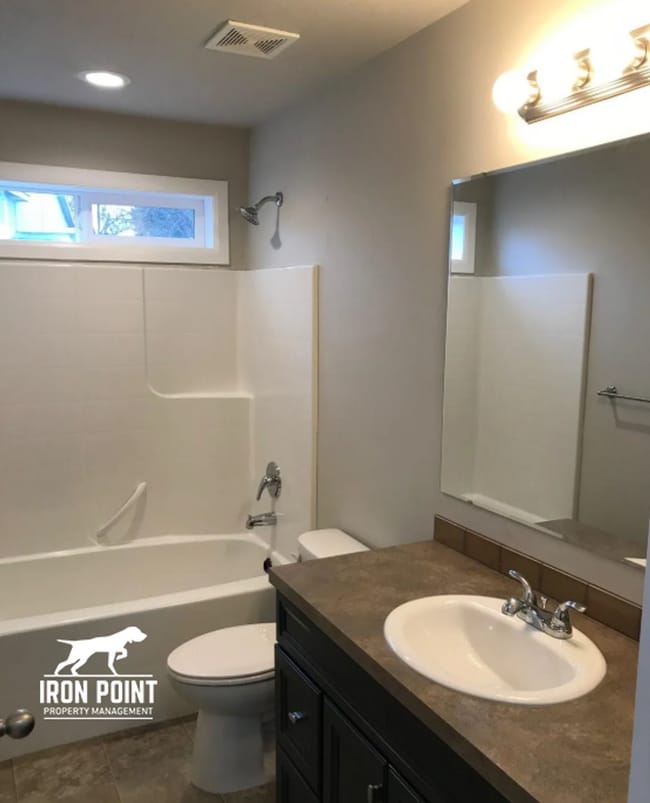 Building Photo - 3bed/2bath - Landscaping Included plus fenced yard, & two car garage.