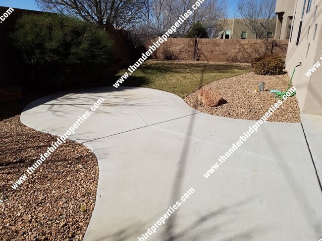 Building Photo - Beautiful and Spacious in NE Heights Gated...