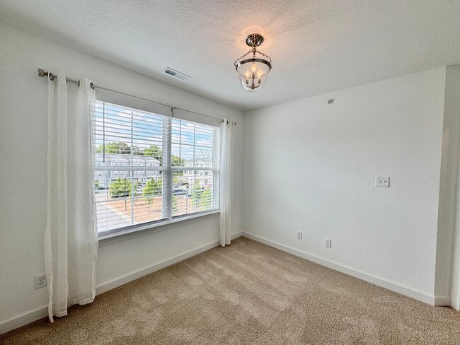 Building Photo - Practically New & Available May 1st! Luxur...