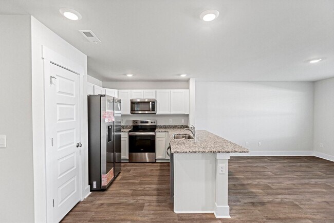 Building Photo - Brand New Townhome- Bike to the beach!!!