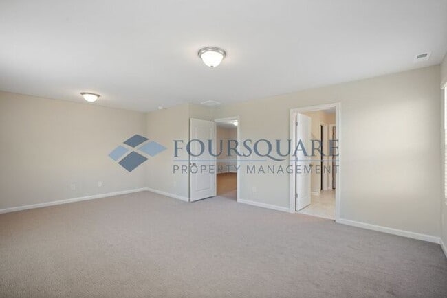 Building Photo - End-Unit Townhome with Loft, Open Floor Plan & Patio, Conveniently Located Near Dining, Shopping,...