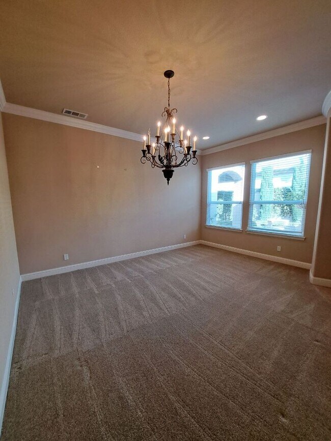 Building Photo - Custom Clovis Residence in Gated Community | Spacious Layout & 3-Car Garage!