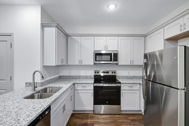 Building Photo - Beautifully Designed Townhome with Upscale Finishes