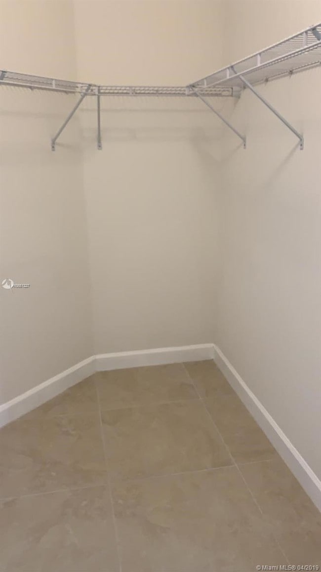 Building Photo - 6175 NW 104th Ct