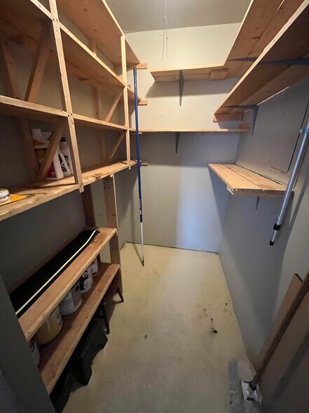 Interior of front porch storage unit - 7511 N Edgewater Ave