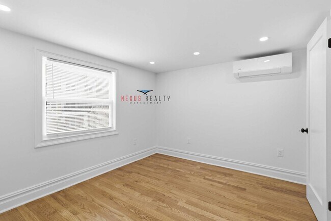 Building Photo - 21-28-28 48th St