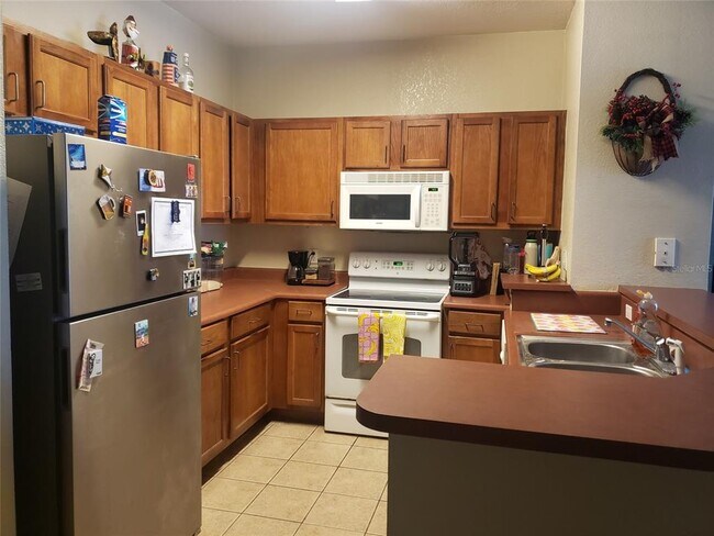 Building Photo - 8102 Lillies Way