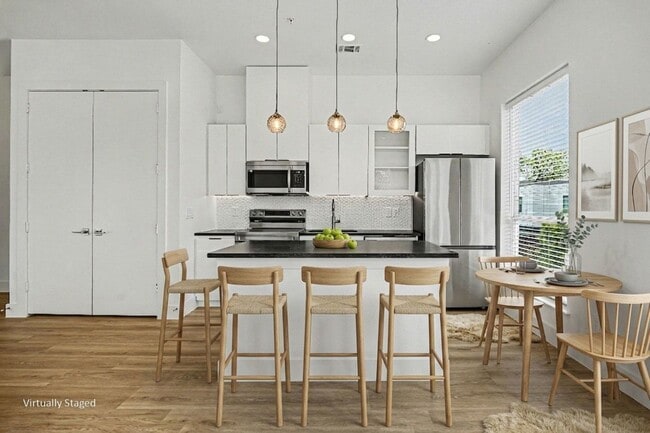 Building Photo - Be the first to live in Unit 207 at 2217 Fitzhugh—a brand-new 2026 construction offering 601 sq f...