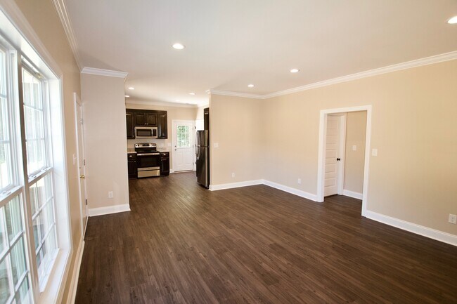 Building Photo - "Brand New Construction."  Quiet location, charming, cozy 3 bedroom duplex