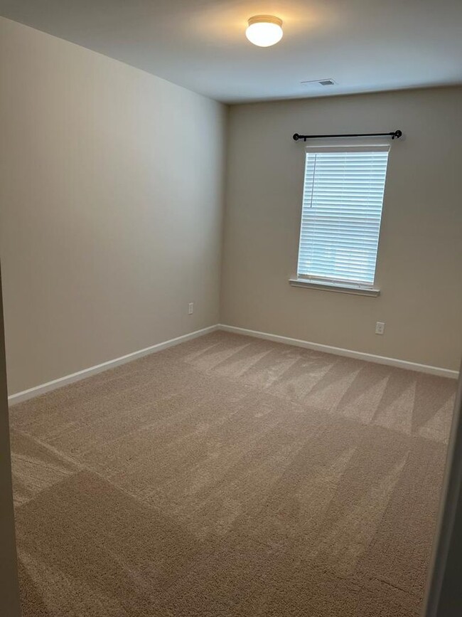 Building Photo - Townhome with 3BR/2.5BA Garage Located in ...