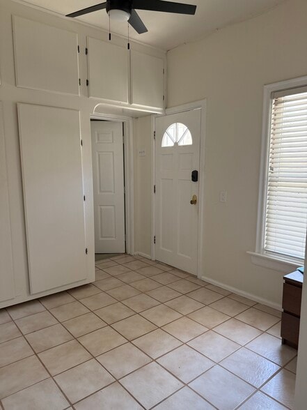 view of kitchenette looking towards entry and door to bdrm. - 305 Emerald St