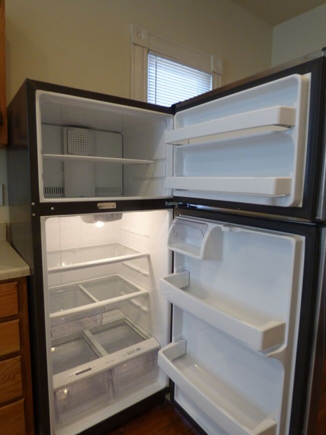 Building Photo - Vintage, Renovated SF House! High Ceilings, HW Floors, Covered Porch, Off-Street Parking!