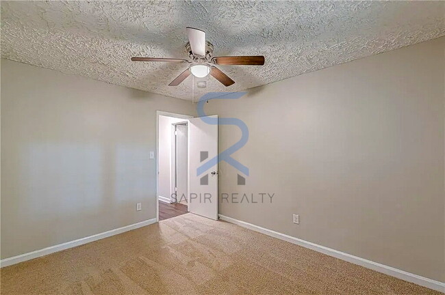 Building Photo - Move in before December 15th and choose your reward: a $250 Amazon Gift Card or a 55" Smart TV!