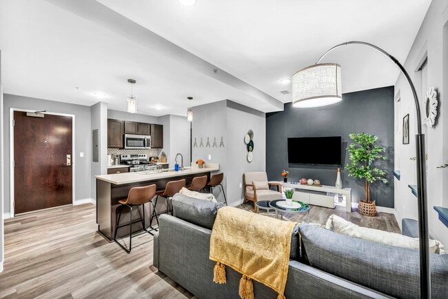 1BR, 1BA - 564SF - Living Room - The Athlon