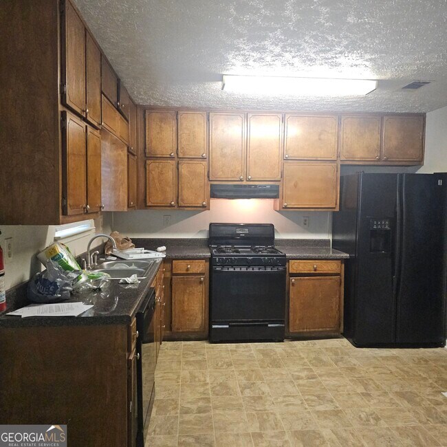 Building Photo - 5906 Summerglen Ln