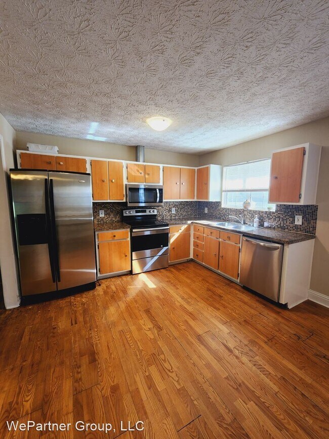 Building Photo - 4 br, 2 bath House - 3414 Windgate Dr