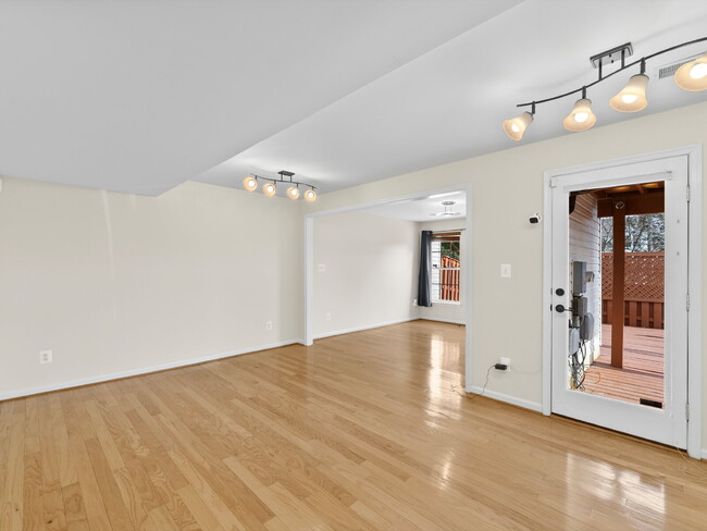 Building Photo - Sunlit Sanctuary Awaits: Spacious Townhous...