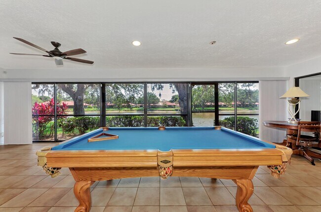 Building Photo - BEAUTIFUL 2 BEDROOM 2 BATHROOM + A DEN VILLA WITH GORGEOUS LAKE VIEWS!