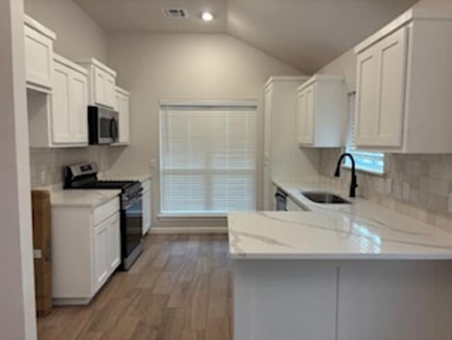 Building Photo - First Month Free - New Home!