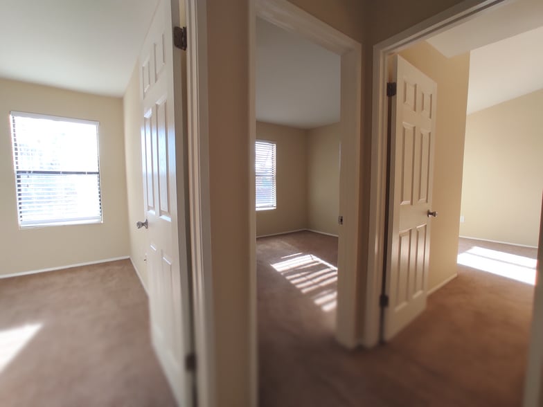 3 beds near end of hallway - 9428 Twin Trails Dr