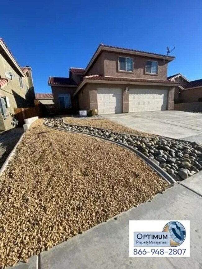 Building Photo - Spacious 4-Bedroom Home with 3-Car Garage & Downstairs Suite!