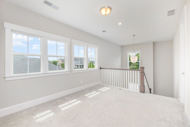 Building Photo - Exclusively Offered by Muse Realty Rentals...