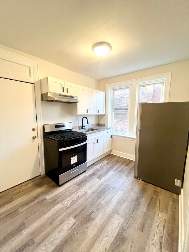 Building Photo - 4134 W 24th Pl