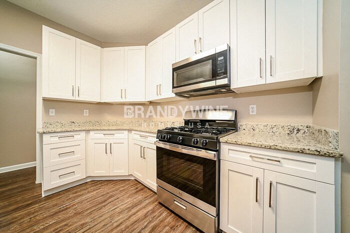 Building Photo - 6366 Wellesley Dr