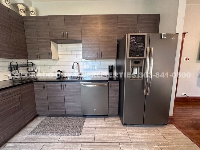 Building Photo - A home where old-world charm meets modern sophistication!