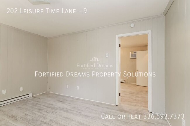 Building Photo - 202 Leisure Time Ln