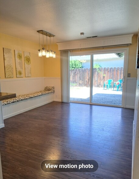 Large dinningroom leads to large patio and yard - 940 E Lassen Ave