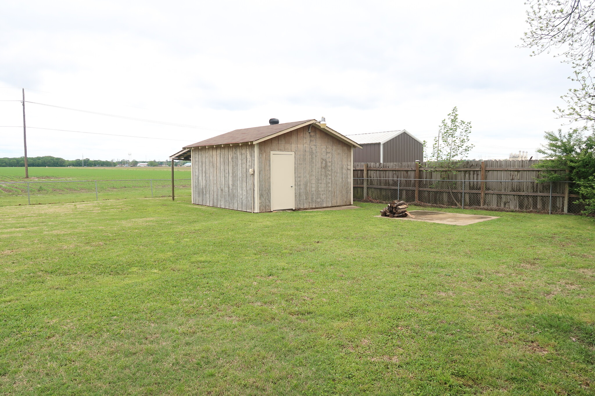 storage shed in back yard - 1038 Old Sterlington Rd