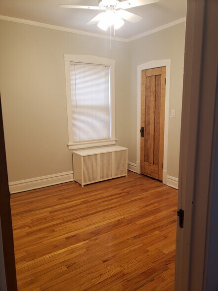 Bedroom with hardwood floors - 3811 N Central Park Ave
