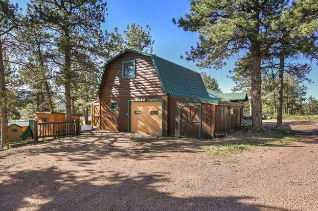 Building Photo - 3 bed 2 Bath Log Home on 2 Acres in Florissant