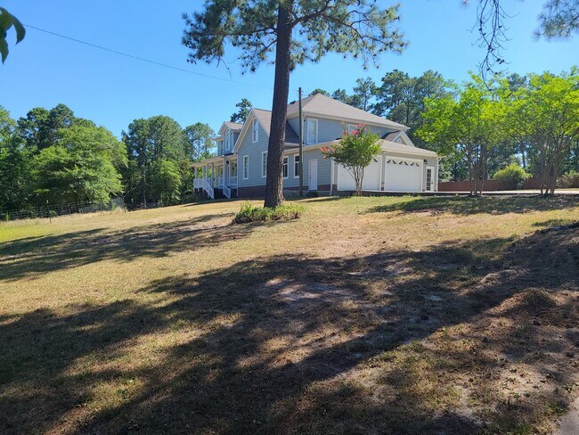 Building Photo - Serene 3-Acre Homestead in Sanford, NC – Ideal for Country Living!