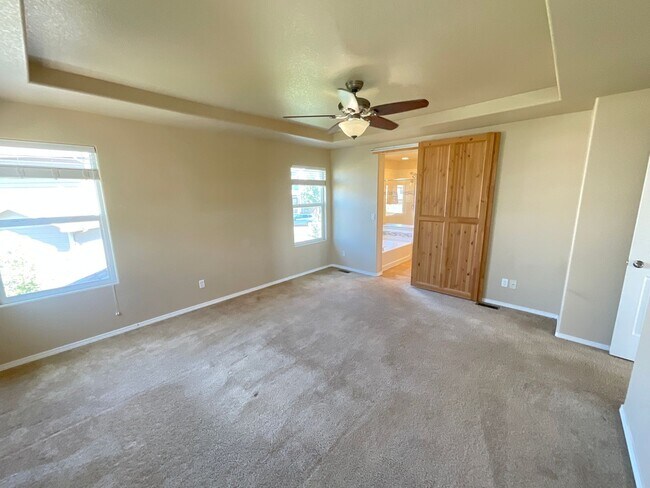 Building Photo - 4 Bedroom Home Available Near Voyager Pkwy...