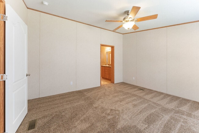 Building Photo - 202 Wild Flower Dr